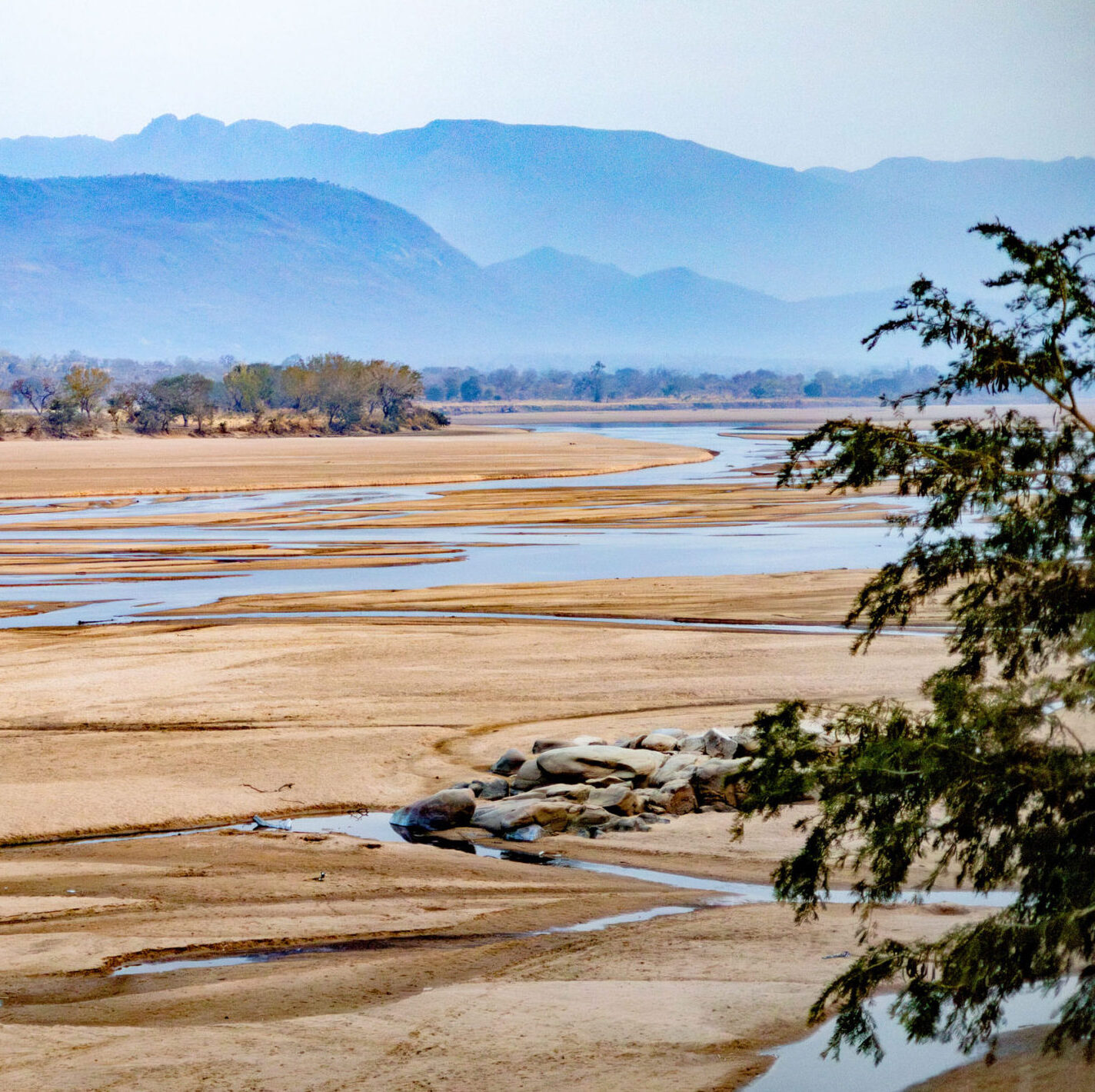 A river and mountains.