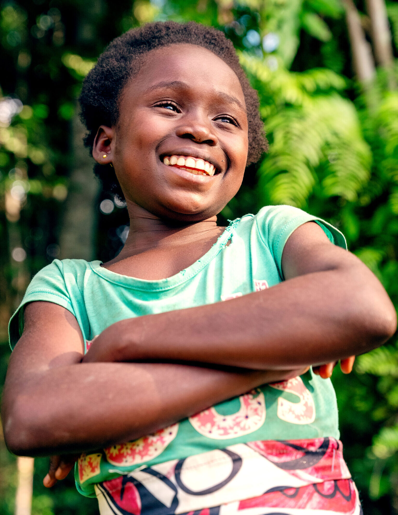 A child smiles.